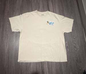 The Smurfs Smurf League Championship Doubles Tennis Graphic T-Shirt